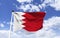 Bahrain flag template floating under a blue sky.