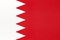 Bahrain national fabric flag, textile background. Symbol of international asian world country