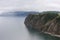 Baikal Lake in summer. View of the  Olkhon Island in rainy and foggy weather.  Lake natural background.