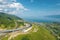 The Baikal serpentine road - aerial view of natural mountain valley with serpantine road, Trans-Siberian Highway, Russia