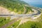 The Baikal serpentine road - aerial view of natural mountain valley with serpantine road, Trans-Siberian Highway, Russia