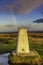 Baildon Moor sunset and storm clouds and trigg point