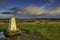 Baildon Moor sunset and storm clouds and trigg point