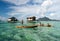 Bajau Laut children paddling boat near Tun Sakaran Marine Park