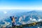 Bajawa - a girl standing on the top of the volcano, admiring the view