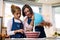 They always bake as a mother and daughter team. a mother and her little daughter baking together at home.