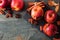 Baked apples with caramel, brown sugar and and nuts, top view on a dark background