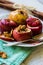 Baked apples with walnuts, honey and cinnamon, dessert