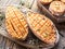 Baked batata on the old wooden table