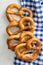 Baked bavarian pretzels on checkered napkin