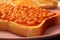 Baked beans on white toasted bread