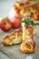 Baked braided pigtails with apples