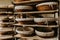 Baked bread in basked over kitchen background