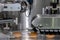 Baked bread on the conveyor belt moving to pack in the plastic bag at production line machine in bakery manufacture factory. food