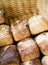 Baked Bread Loaves Displayed in Wicker Basket
