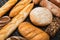 Baked bread loaves on wooden black