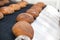 Baked Breads on the production line at the bakery