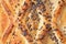 Baked bun of puff pastry sprinkled with poppy seeds. Close-up. Food background.