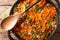 Baked cabbage with ground beef, onions and cheese close-up in a pan. horizontal top view