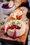 Baked camembert with cranberry sauce and thyme