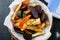Baked carrots and beets with herbs
