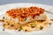 Baked cod fillet with sauce