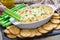 Baked crab dip, served with celery sticks and crackers