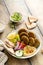 Baked falafel bowl with hummus and vegetables