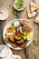 Baked falafel bowl with hummus and vegetables