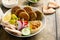 Baked falafel bowl with hummus and vegetables