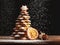 Baked gingerbread christmas tree on wooden background