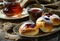 Baked homemade buns with jam and tea. Easter sweets