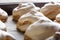 Baked homemade meringues on tray