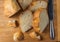 Baked homemade white wheet bread on wooden desk.