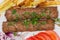 Baked lula kebab with French fries, top view close-up