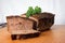 Baked meat loaf with parsley on a timber board