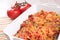 Baked meat and vegetables casserole with cheese