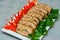 Baked minced meat with mushrooms, red pepper and parsley, Meat loaf in white plate