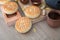 Baked moon cakes and wooden molds, tea cups and teapots