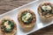 Baked mushrooms stuffed with spinach and cheese