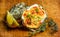 Baked oyster shell with cheese, served parsley and lemon