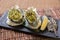 Baked oysters with lemon