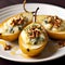 Baked pear close-up, gourmet dish concept. Pear baked with blue cheese, honey and walnuts served on a white plate on a dark