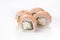 Baked Philadelphia sushi rolls on a white background. Isolated. Restaurant concept. Close-up