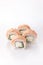 Baked Philadelphia sushi rolls on a white background. Isolated. Restaurant concept. Close-up