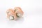 Baked Philadelphia sushi rolls on a white background. Isolated. Restaurant concept. Close-up