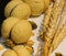 Baked Pieces of Bread Loaves and Ears of Wheat and Dried Roses as Decoration of Gourmet Bakery