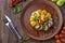 Baked pork served with french fries, corn and pesto, restaurant platter, Horizontal orientation, Closeup