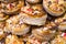 Baked portioned round tartlets made of puff pastry with crab che