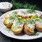 baked potatoes with yogurt sauce and dill 2